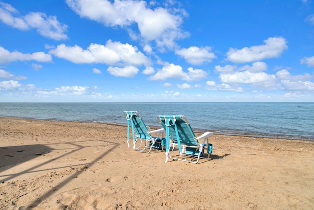 view of water feature with a beach view