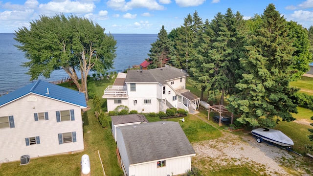 drone / aerial view with a water view