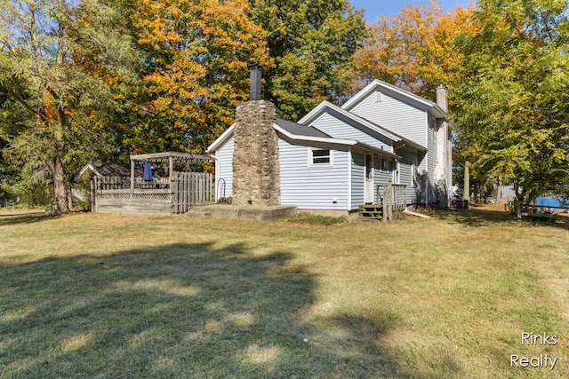 view of property exterior with a yard