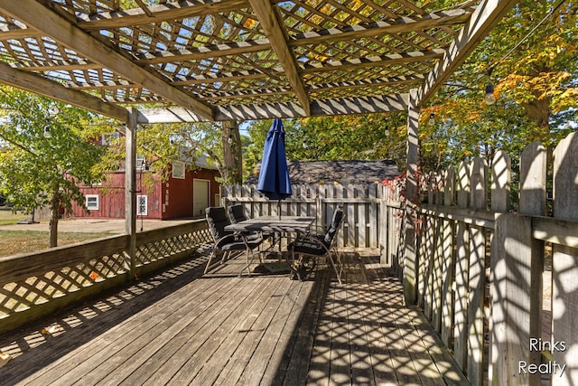 wooden terrace with a pergola