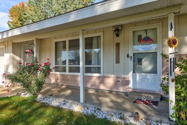 entrance to property with a porch