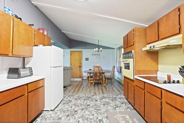 kitchen with white appliances, vaulted ceiling, decorative light fixtures, light hardwood / wood-style flooring, and an inviting chandelier