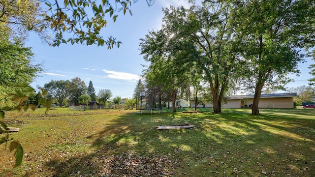 view of yard featuring a trampoline