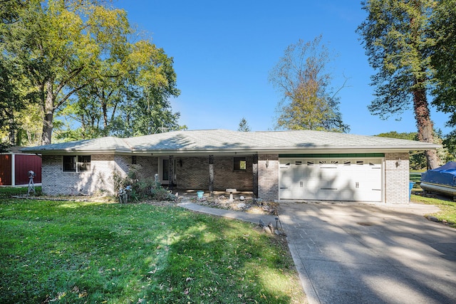 ranch-style house with a garage and a front yard