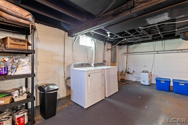 basement with separate washer and dryer