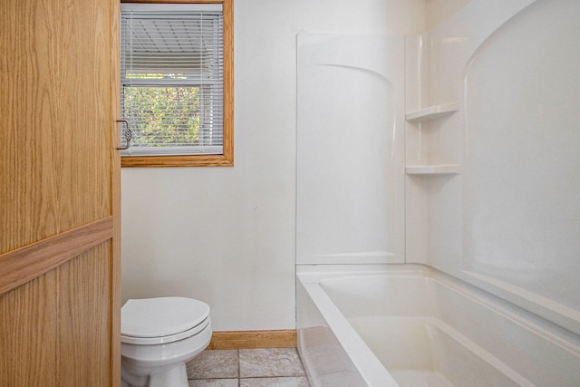 bathroom featuring tile patterned floors and toilet