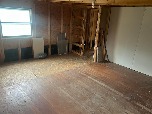 unfurnished room featuring hardwood / wood-style floors