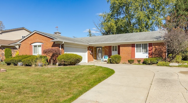 single story home with a front yard and a garage