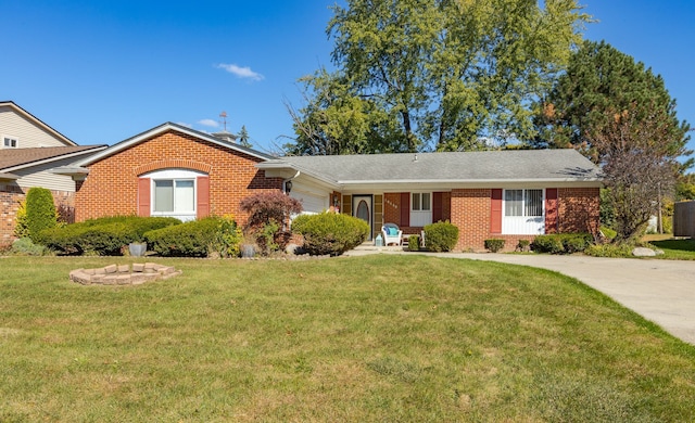 ranch-style house with a garage and a front lawn