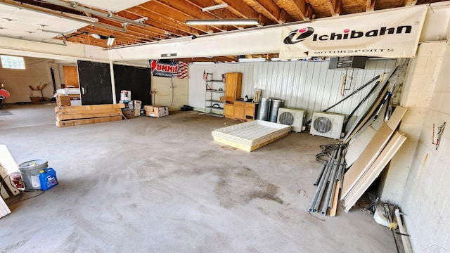 garage featuring ac unit