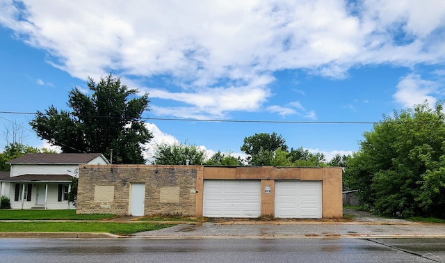 garage with a lawn