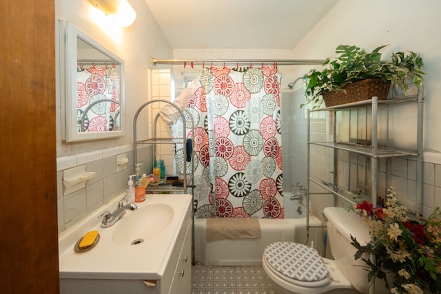 full bathroom with tile patterned floors, vanity, toilet, and shower / tub combo