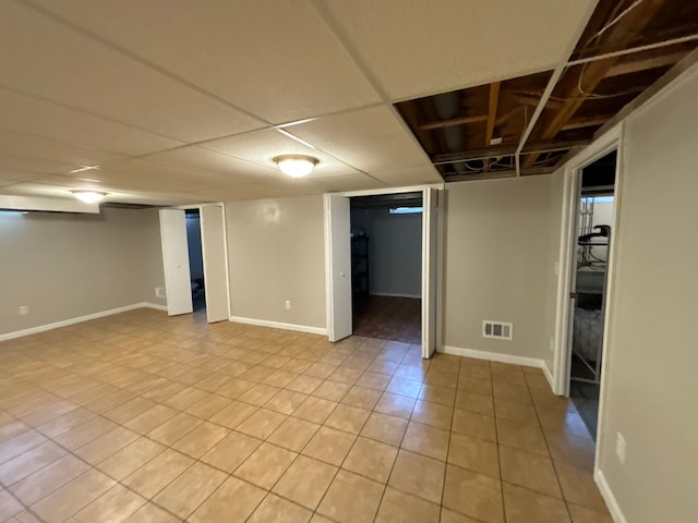 basement with light tile patterned floors