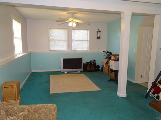 interior space featuring ceiling fan and carpet floors