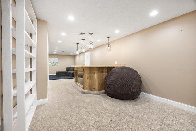11600 Baker Rd, Greenville, MI 48838 - indoor bar with light carpet, recessed lighting, baseboards, and hanging light fixtures