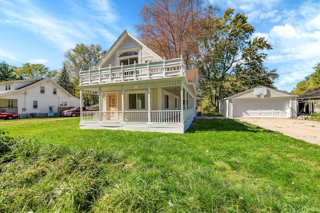 victorian-style house with a front yard, a porch, a garage, and an outdoor structure