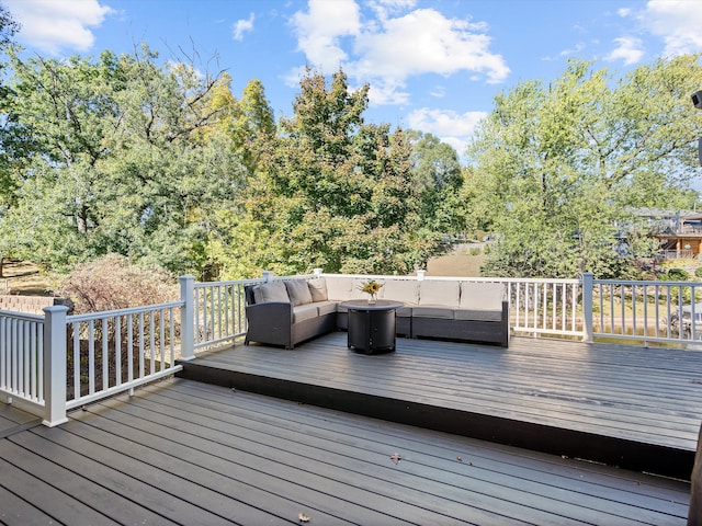 deck featuring an outdoor living space