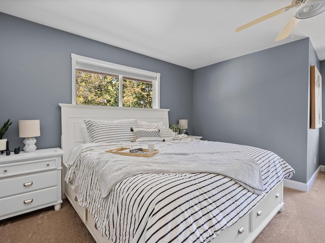 bedroom featuring ceiling fan and carpet floors