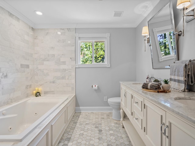 bathroom with vanity, a bathtub, a wealth of natural light, and crown molding