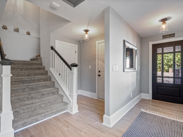 entrance foyer with light hardwood / wood-style floors