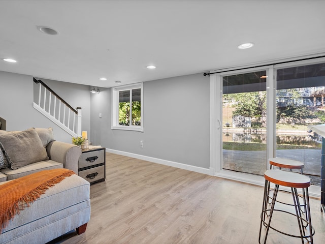 living room with light hardwood / wood-style floors