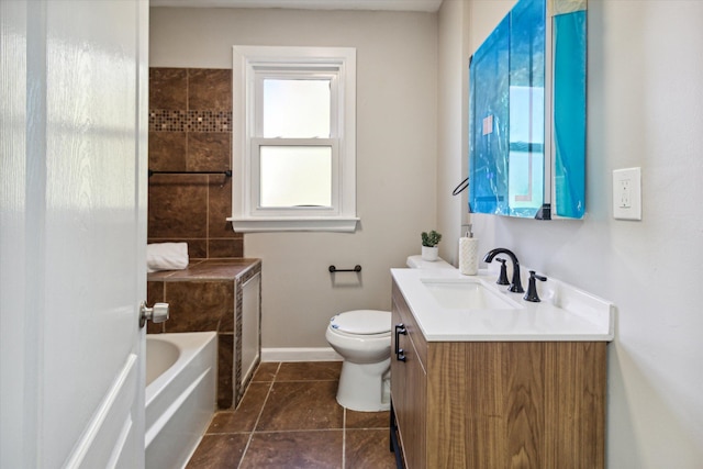 bathroom with tile patterned floors, vanity, and toilet