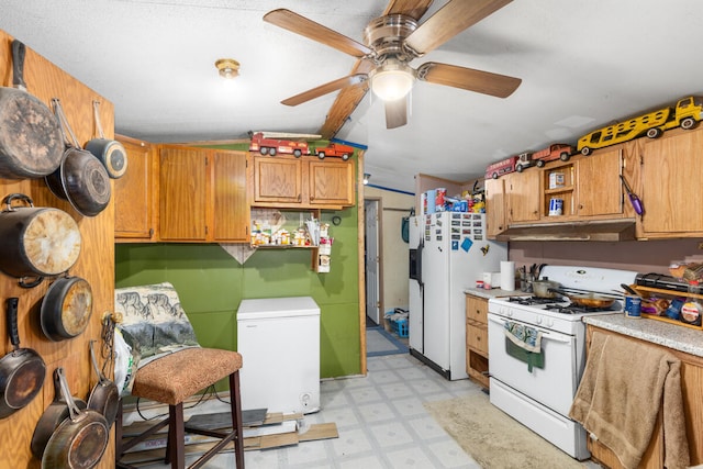 kitchen with ceiling fan and white appliances