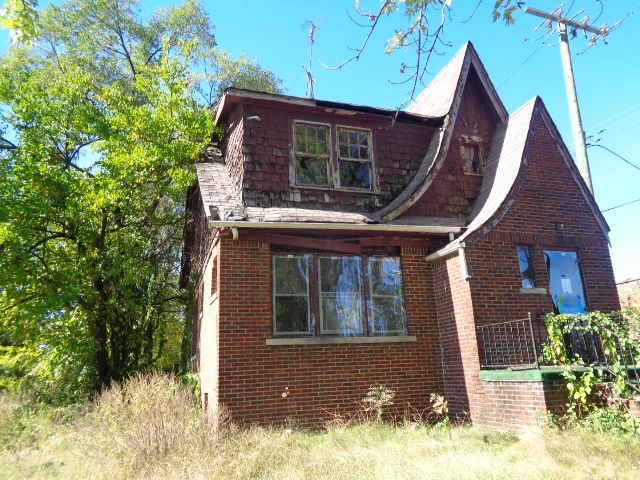 16017 San Juan Dr, Detroit, MI 48238 - view of side of home featuring brick siding
