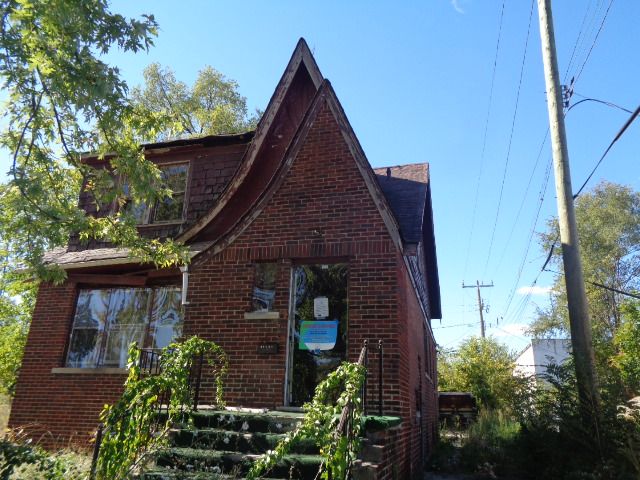 16017 San Juan Dr, Detroit, MI 48238 - view of front of house featuring brick siding