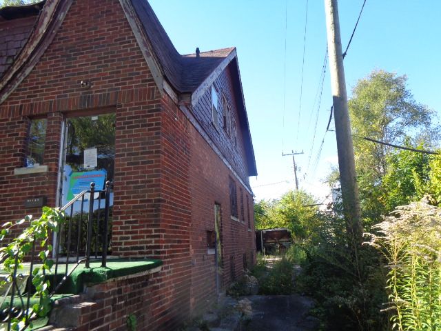 16017 San Juan Dr, Detroit, MI 48238 - view of property exterior featuring brick siding