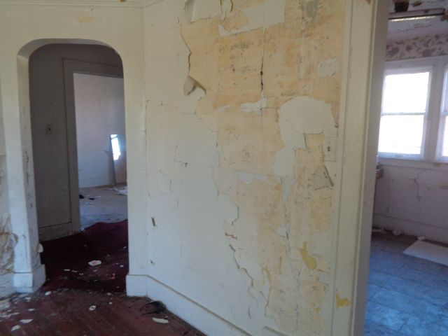 16017 San Juan Dr, Detroit, MI 48238 - spare room featuring arched walkways