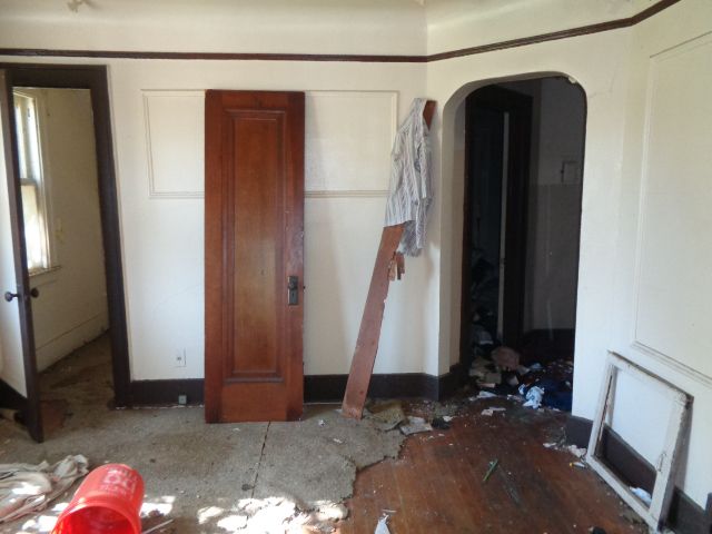 16017 San Juan Dr, Detroit, MI 48238 - unfurnished bedroom featuring arched walkways