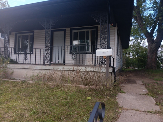 view of home's exterior featuring a porch