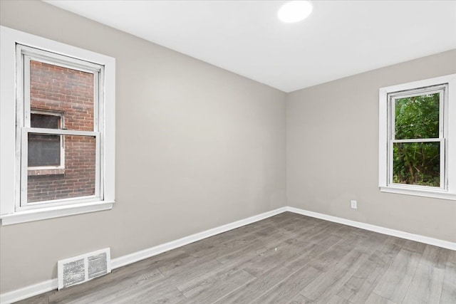 empty room with light wood-type flooring