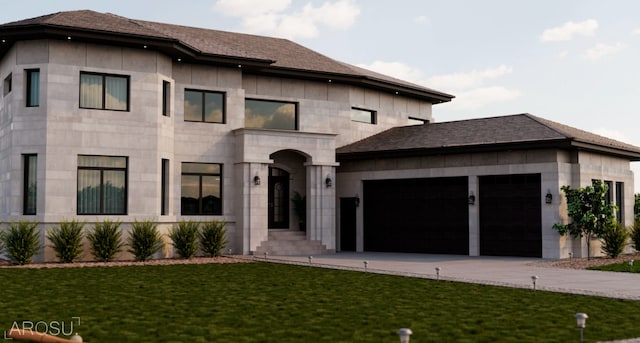 view of front facade with a front yard and a garage