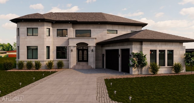 prairie-style home with french doors, a front yard, and a garage