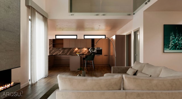 living room with wood-type flooring and a wealth of natural light