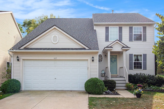 view of front of property with a garage