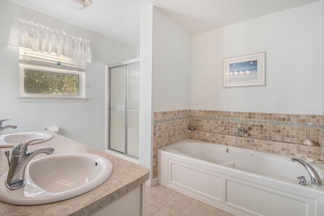 bathroom featuring tile patterned floors, vanity, and independent shower and bath