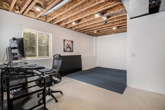 office area featuring concrete flooring