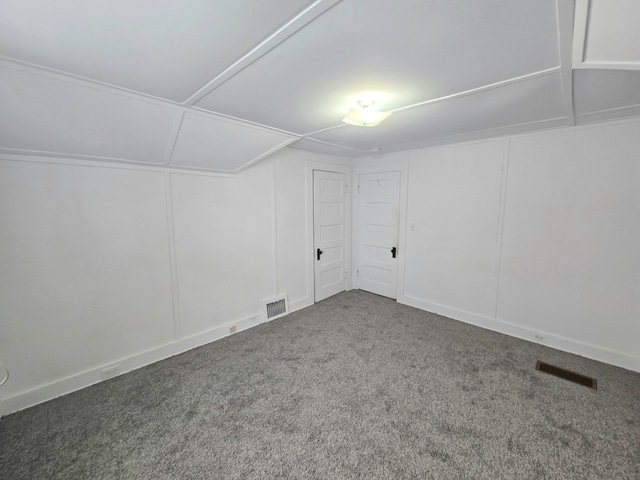 bonus room with carpet flooring