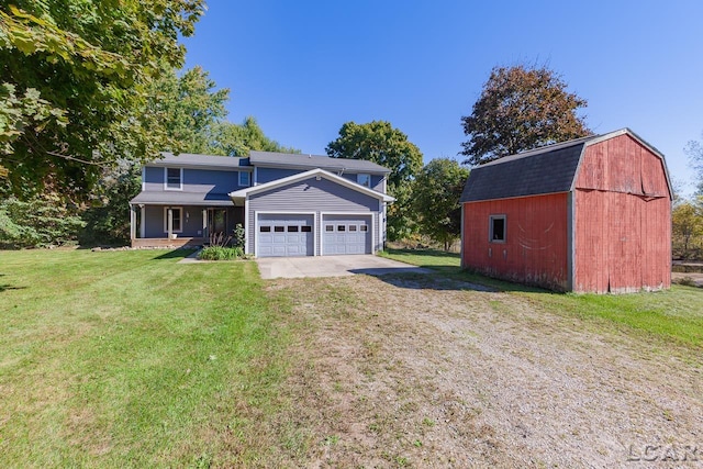 view of property with an outbuilding and a front lawn