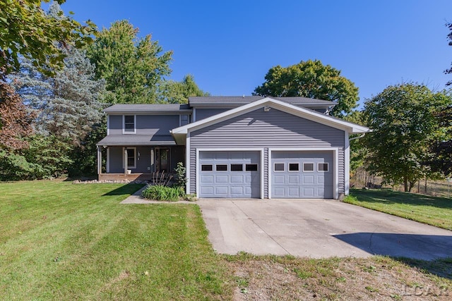 view of front property with a garage, covered porch, and a front lawn