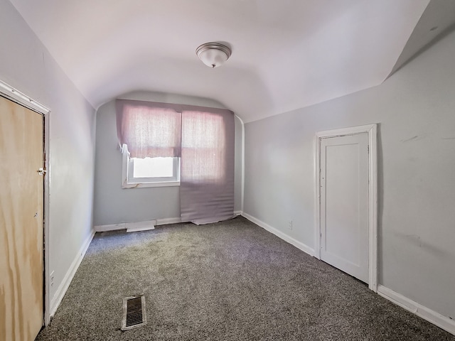 bonus room featuring carpet and lofted ceiling