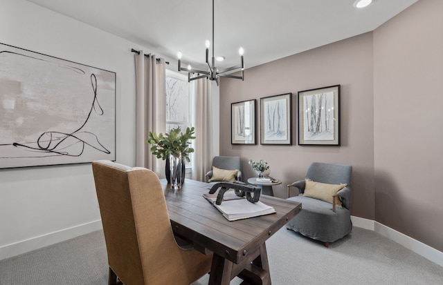 dining area with carpet flooring and a notable chandelier