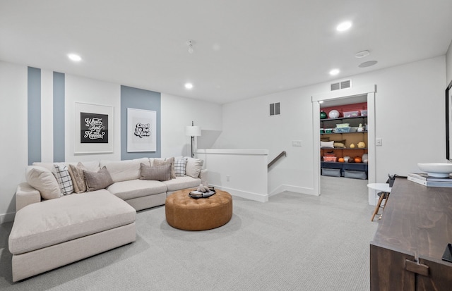 living room featuring light carpet