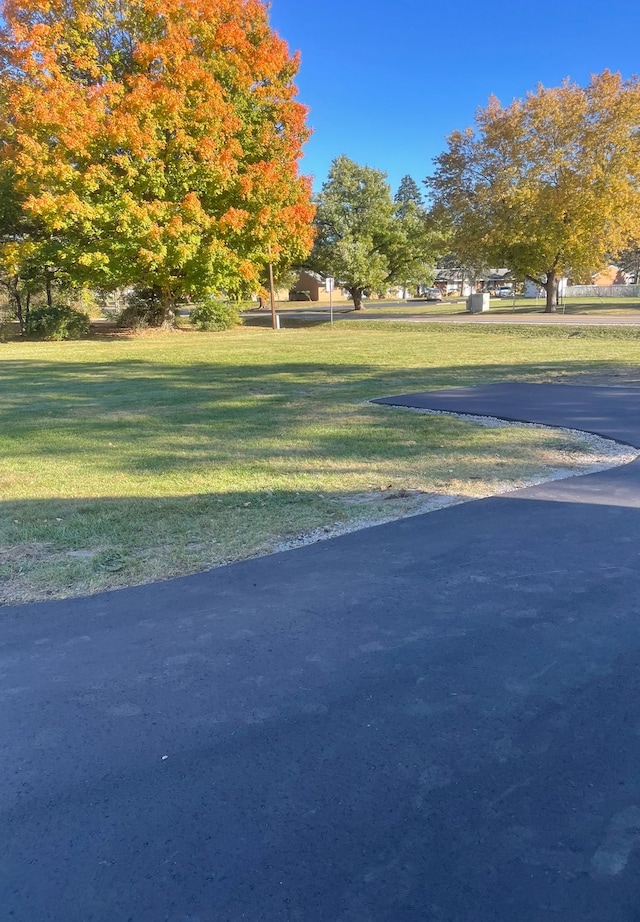 surrounding community featuring a lawn