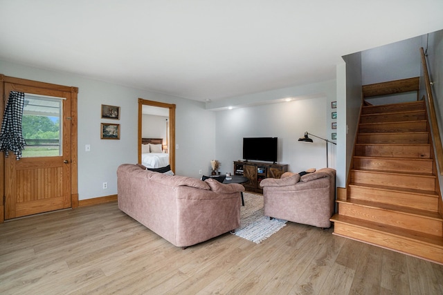 living room with light hardwood / wood-style floors