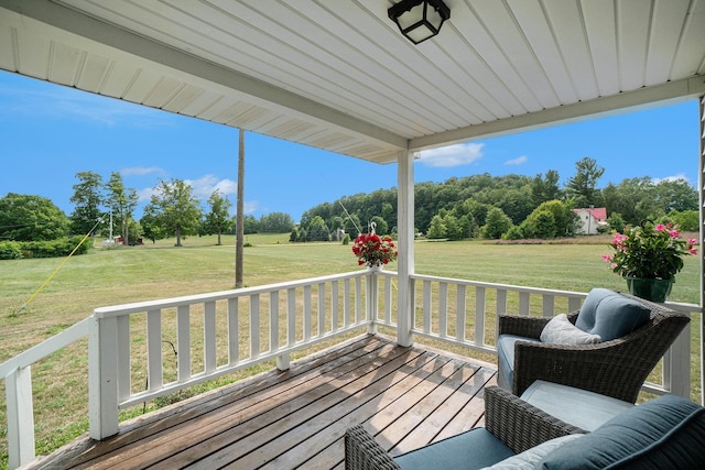 deck featuring a lawn