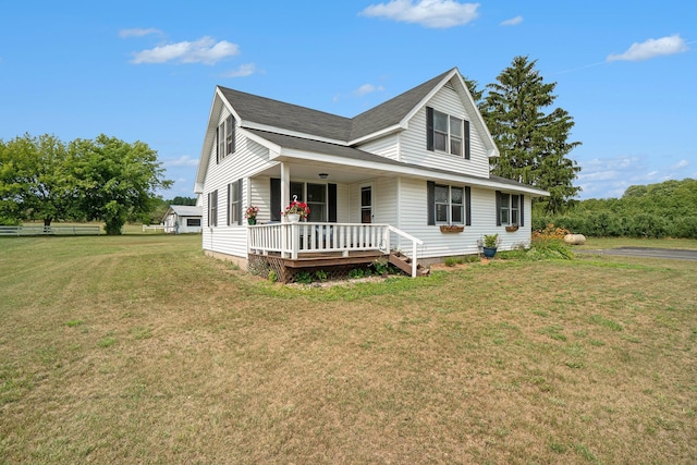 view of front facade with a front lawn and a porch